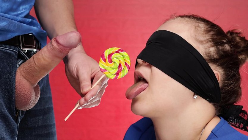 Stick finger to suck Lollipop